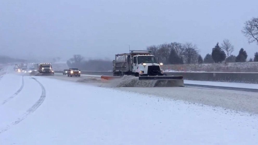 PHOTO: Snowplows on the Kansas Turnpike as north and northeastern parts of Kansas were hit by a winter storm, March 10, 2022.