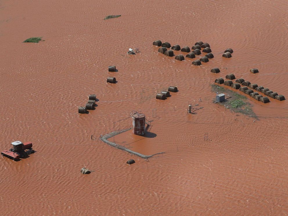 PHOTO: Hay bales and material are photographed in a flooded field on May 21, 2019 in Kingfisher, Okla State. Floods following heavy rains have been a problem throughout the state. 