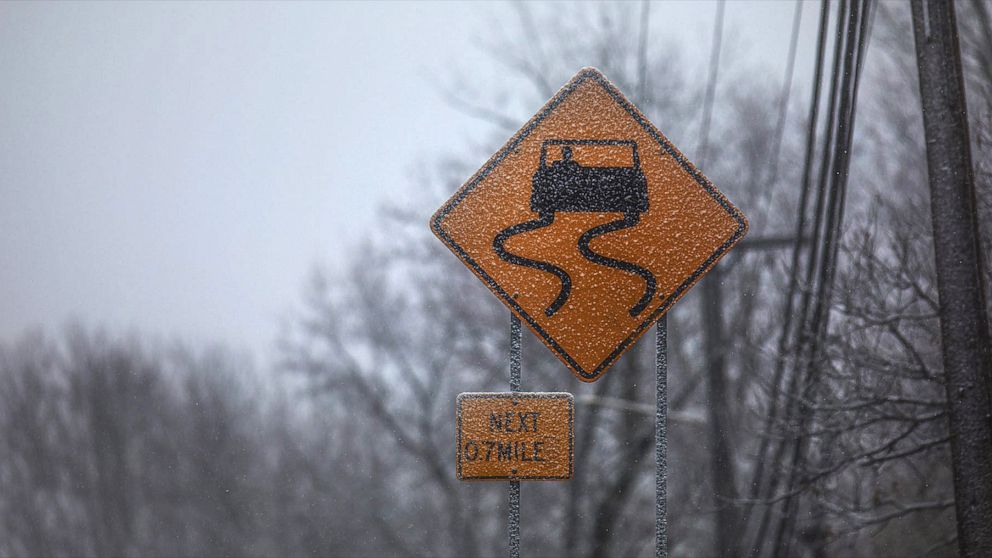 PHOTO: A traffic sign is dusted with snow, Dec. 17, 2019, in Louisville, Ken.