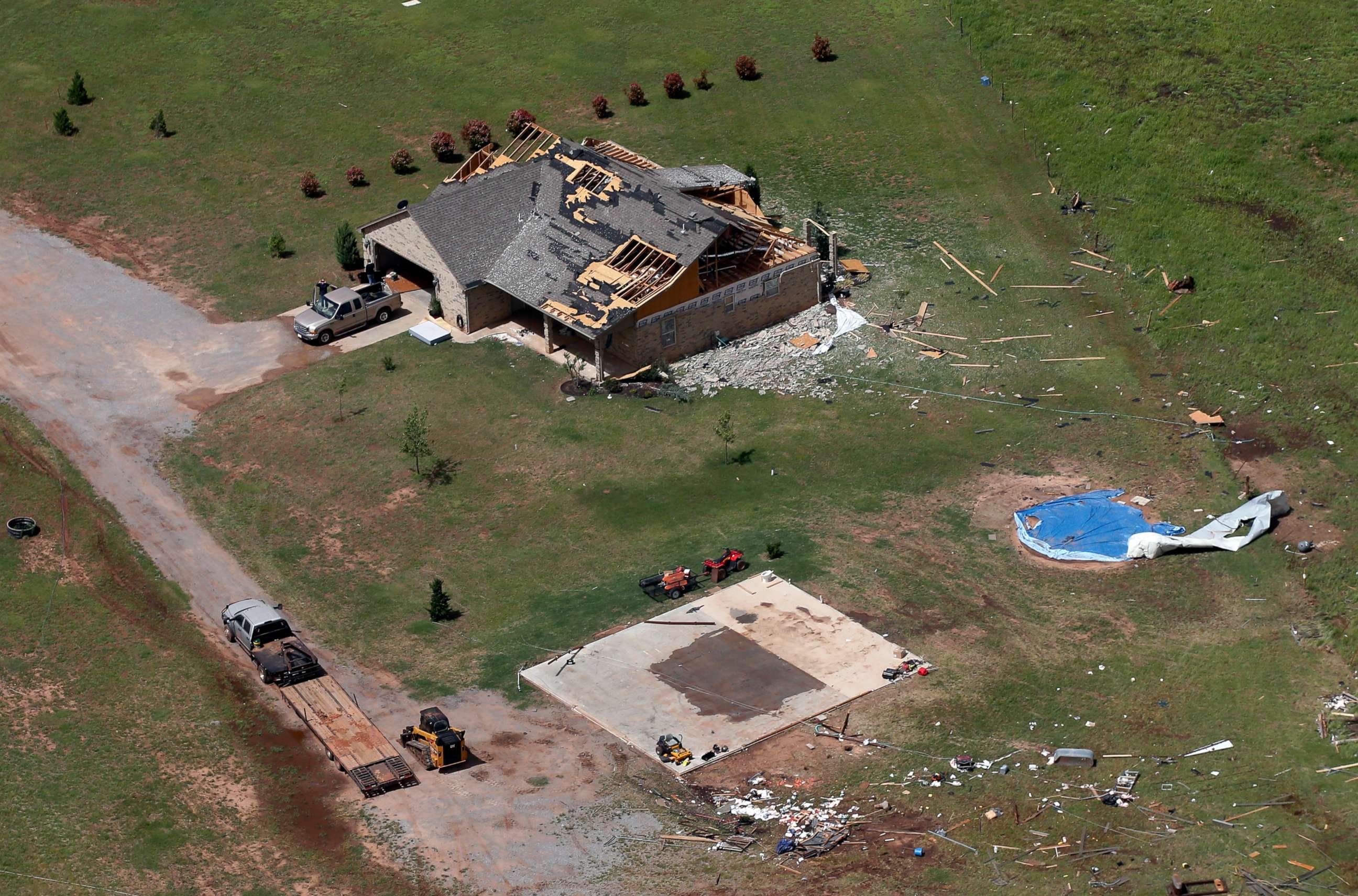 PHOTO: A house damaged in a tornado, May 20, 2019, in Mangum, Okla., is pictured from the air, May 21. A strong band of storms has spawned more than 30 tornadoes across the central U.S.