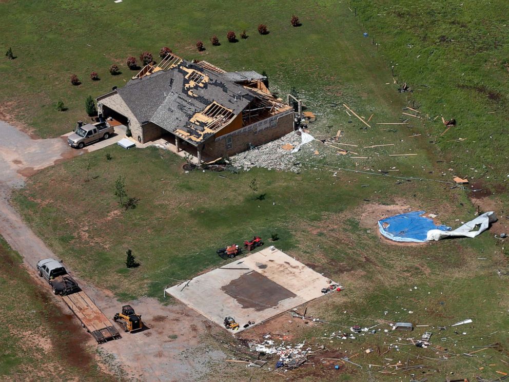 PHOTO: A damaged house in a tornado on May 20, 2019, in Mangum, Oklahoma, is seen from the sky on May 21. A powerful band of storms spawned more than 30 tornadoes across the central United States.