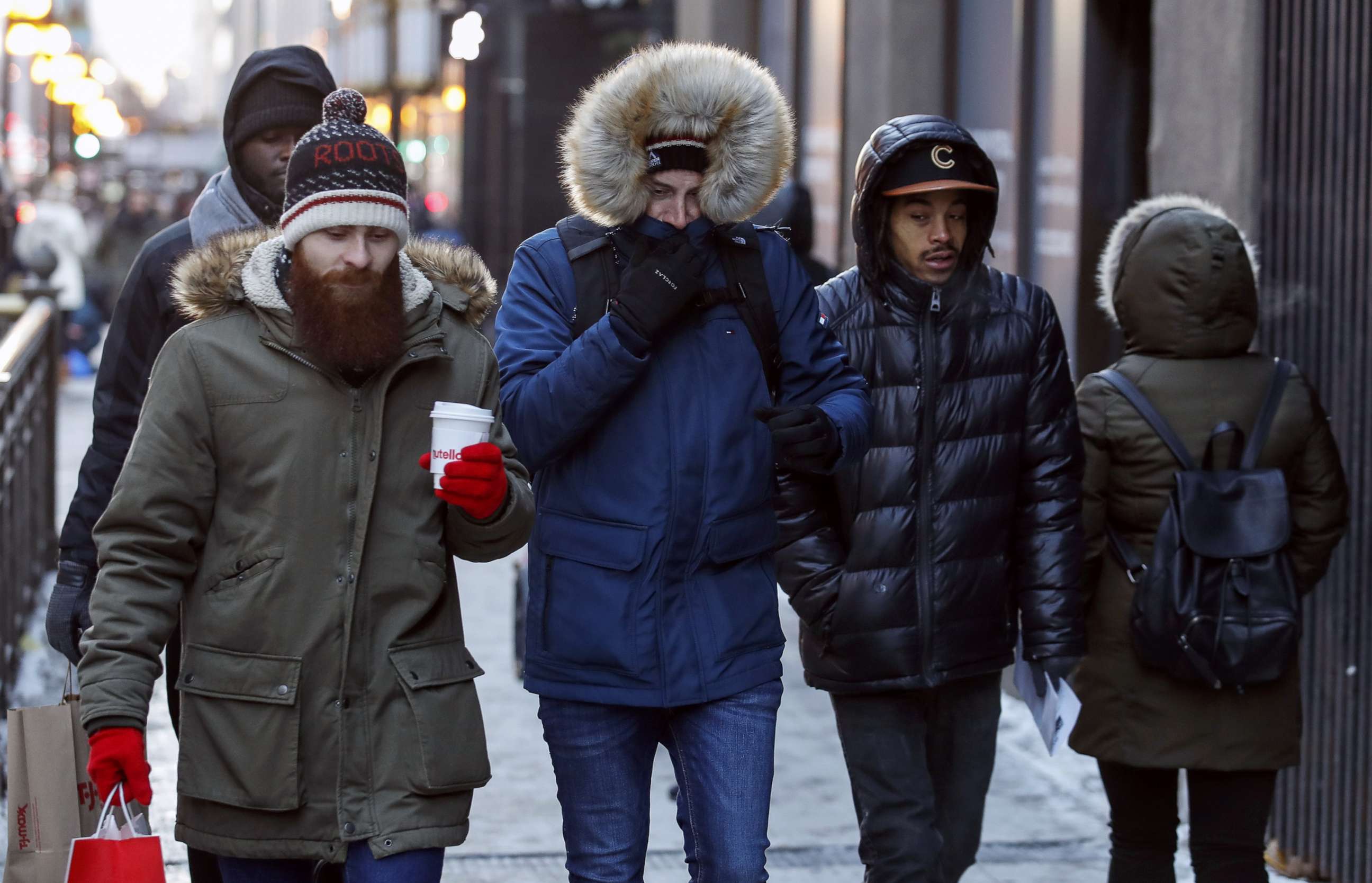 PHOTO: Pedestrians walk along Michigan Avenue in Chicago, Dec. 27, 2017. Frigid temperatures are expected in the single digits in the midwest over the next few days.  