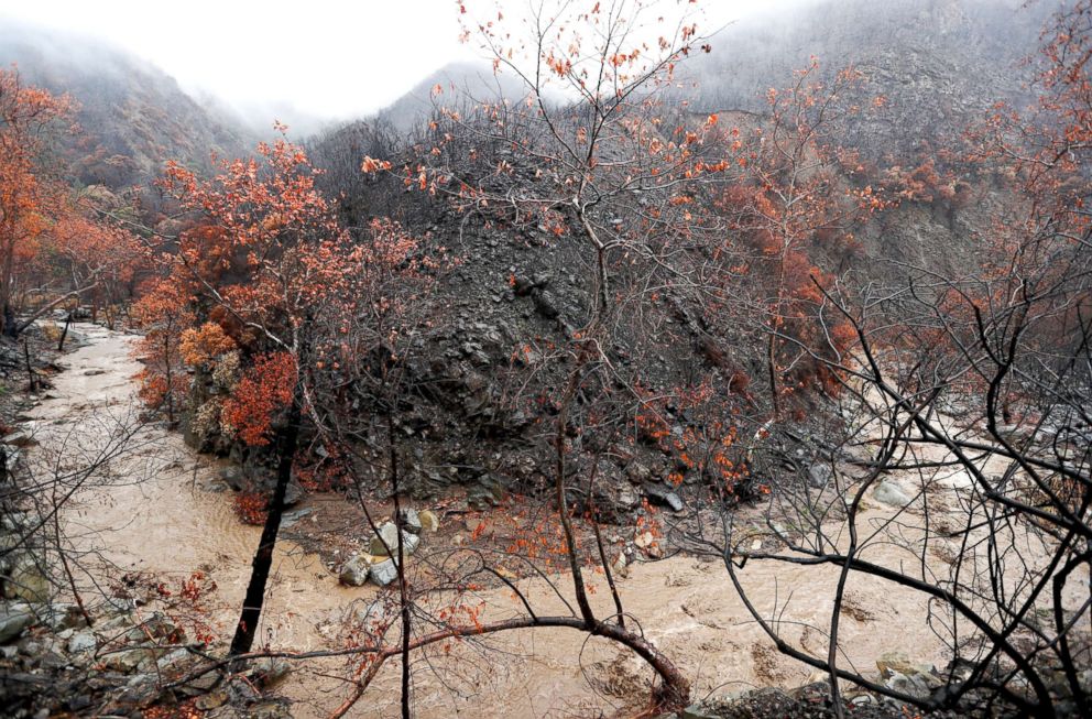 PHOTO: Muddy water runs downstream as heavy rain falls along a stretch of Highway 33 near Ojai, March. 21, 2018.