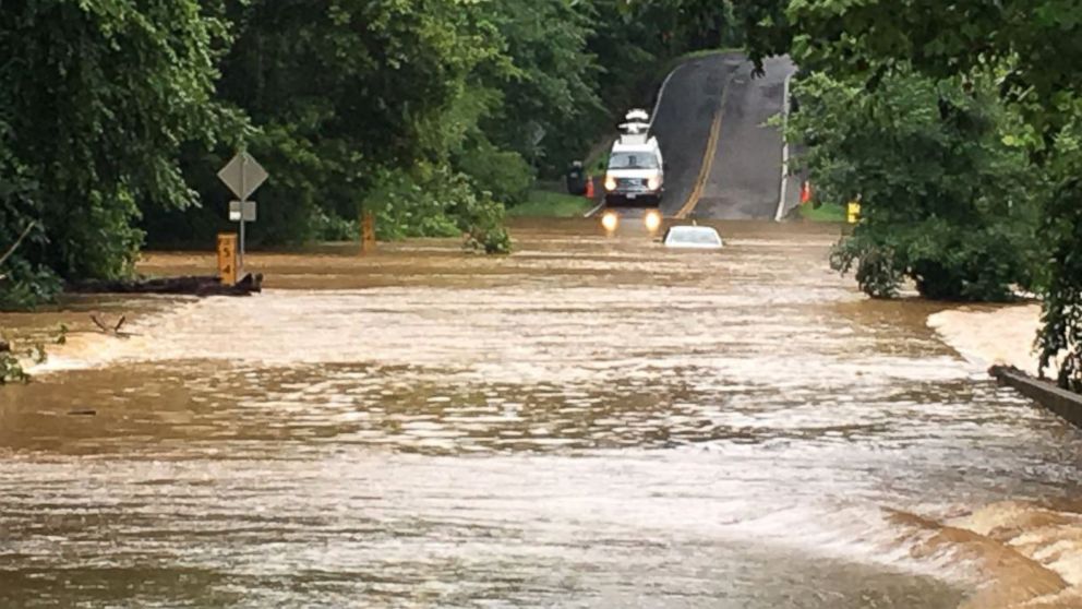 Major flooding set to hit East Coast as West endures scorching