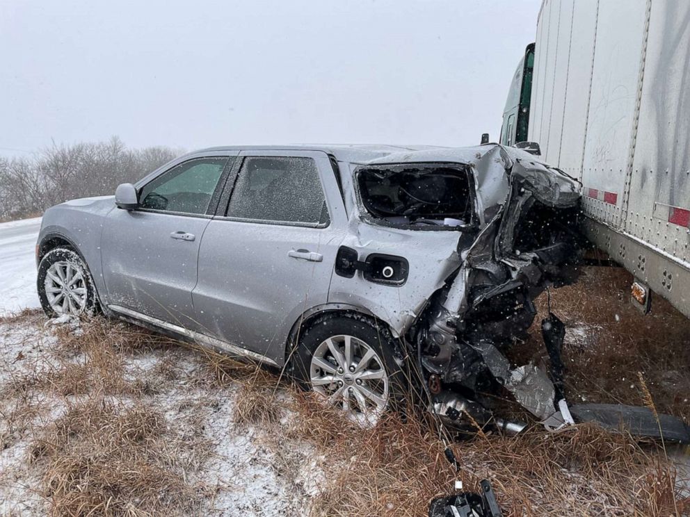 PHOTO: The vehicle of a highway patrol trooper sits on the side of the road after colliding with a semi truck due to icy road conditions in Wabaunsee County, Kansas, Feb. 17, 2022.