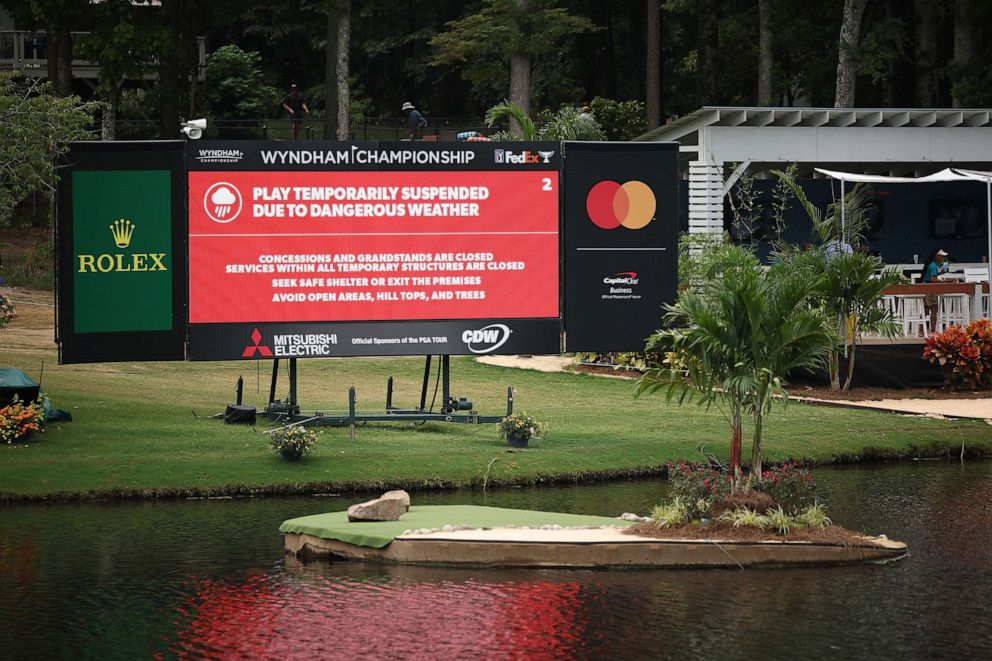PHOTO: General view of a scoreboard showing that play has been suspended due to dangerous weather during the final round of the Wyndham Championship at Sedgefield Country Club on Aug. 6, 2023 in Greensboro, N.C.