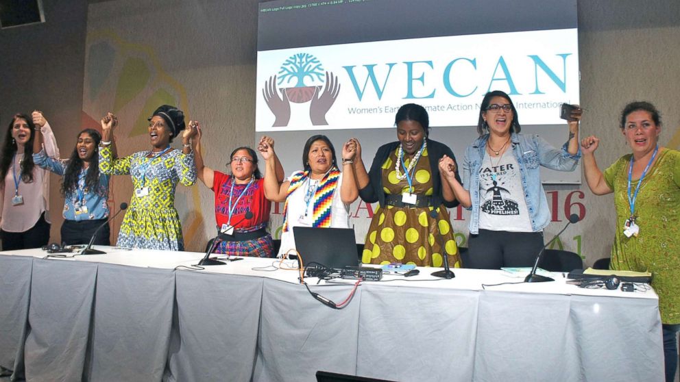 PHOTO: Global women leaders stand together after presenting at a WECAN event inside the United Nations Climate Talks. 