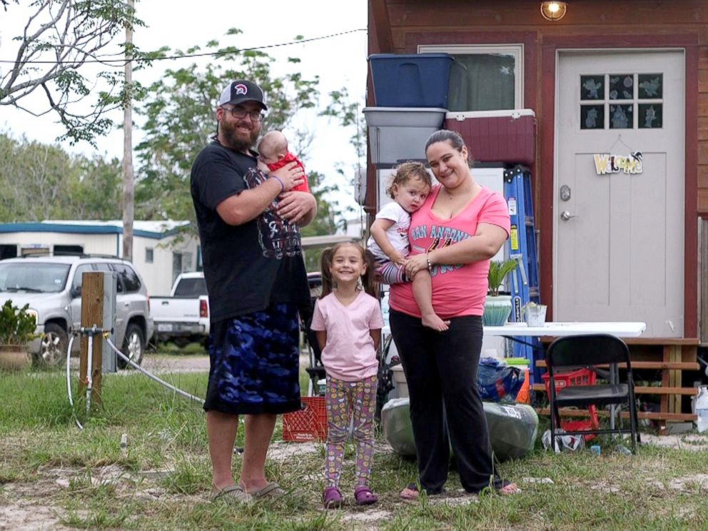 PHOTO: The Weeks family outside their new tiny home on October 31, 2017 in Corpus Christi, Texas.