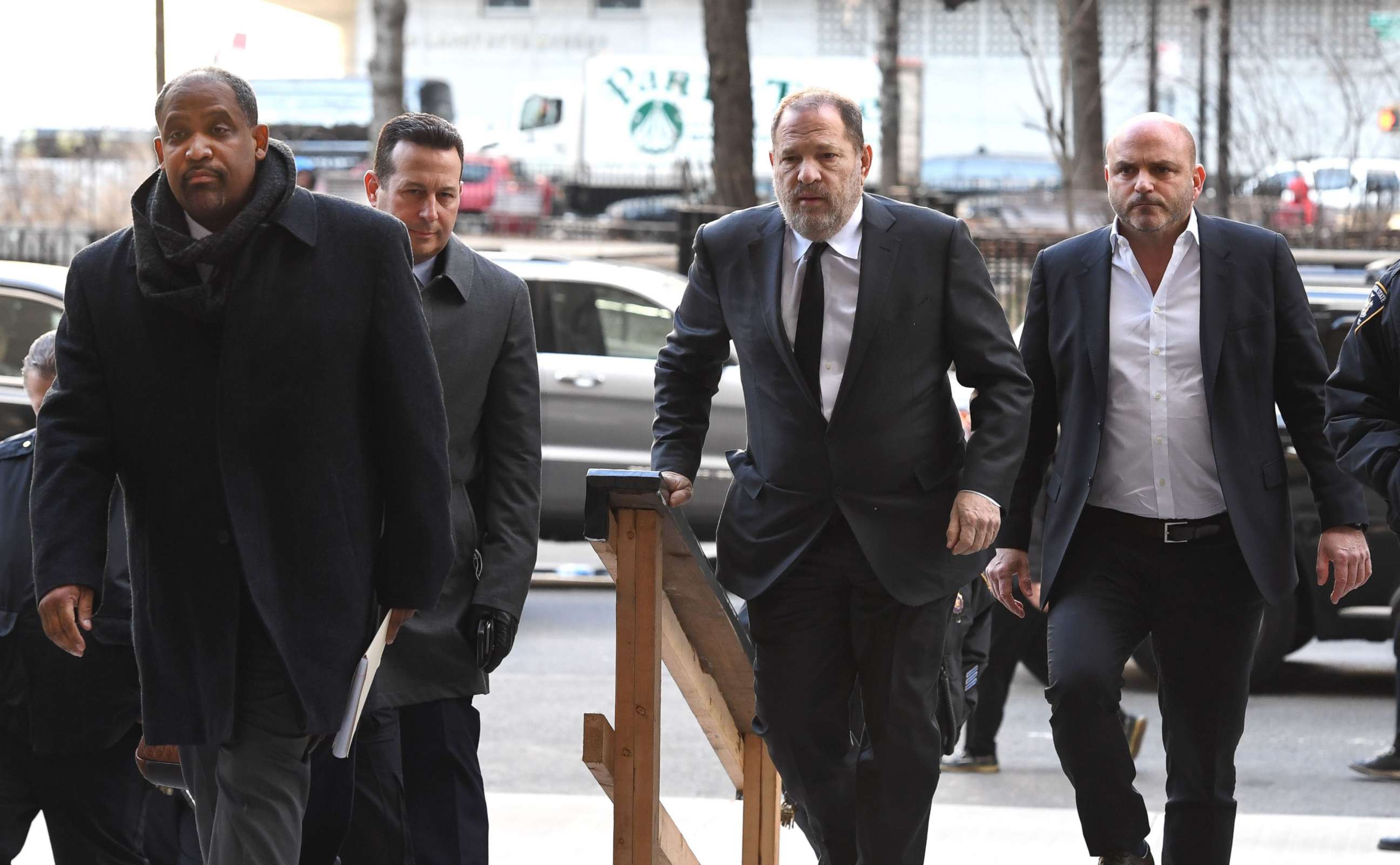 PHOTO: Harvey Weinstein arrives State Supreme Court in Manhattan with his new team of lawyers Jose Baez (2nd L), Ronald Sullivan (L) in N.Y., Jan. 25, 2019.