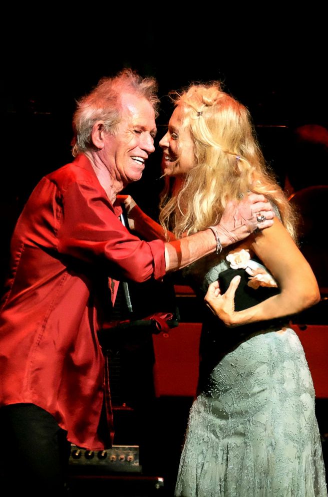 PHOTO: Wendy Oxenhorn plays blues harmonica onstage at the Apollo Theater in New York. 