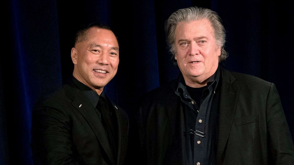 PHOTO: Former White House Chief Strategist Steve Bannon, right greets fugitive Chinese billionaire Guo Wengui before introducing him at a news conference, Nov. 20, 2018, in New York.