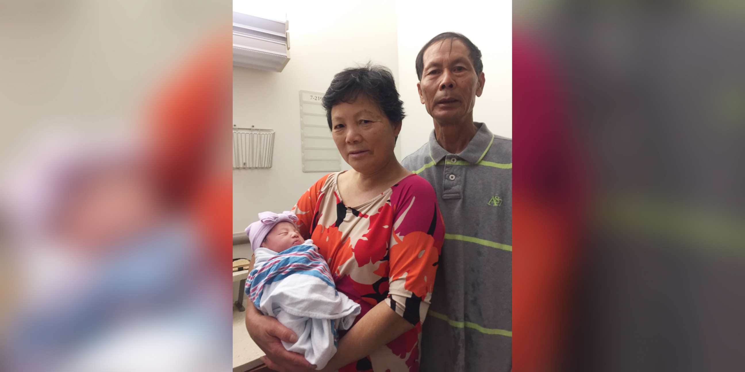 PHOTO: The parents of fallen NYPD Detective First Grade WenJian Liu hold their newborn granddaughter, Angelina.