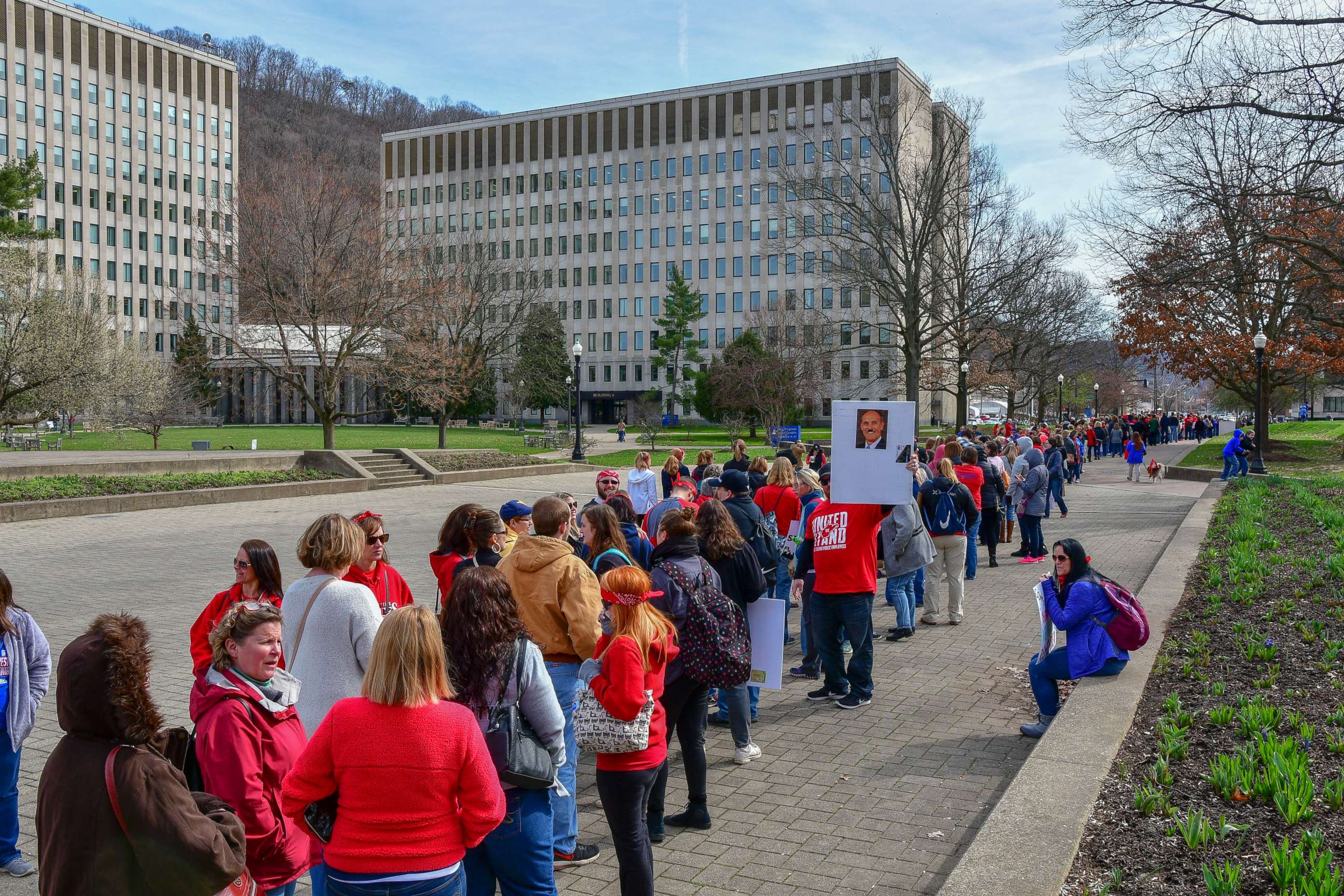 PHOTO: Hundreds of teachers wait in a line to enter the State Capitol, March. 5, 2018, in Charleston, W.V. Hundreds of teachers from 55 counties are on strike for pay raises and better health benefits.
