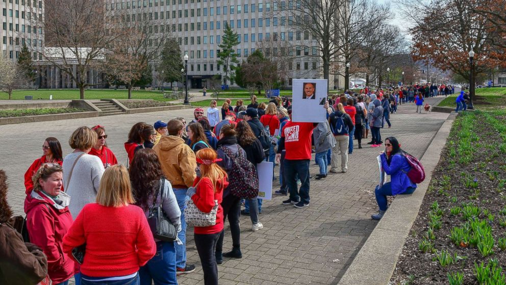 PHOTO: Hundreds of teachers wait in a line to enter the State Capitol, March. 5, 2018, in Charleston, W.V. Hundreds of teachers from 55 counties are on strike for pay raises and better health benefits.