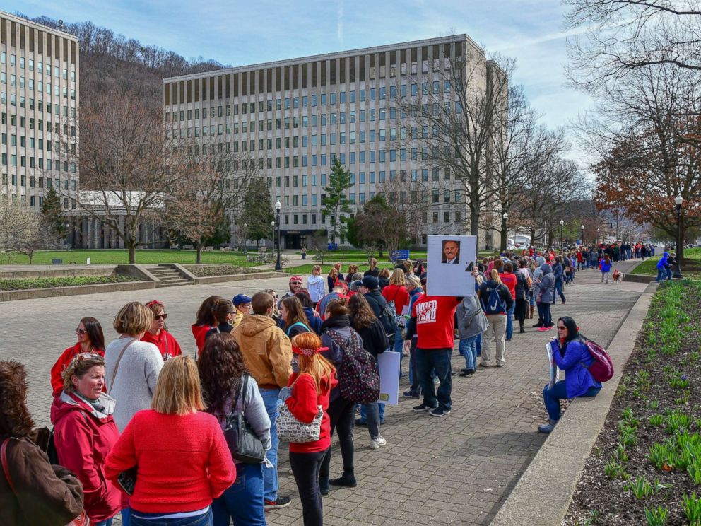 PHOTO: Hundreds of teachers wait in a line to enter the State Capitol, March. 5, 2018, in Charleston, W.V. Hundreds of teachers from 55 counties are on strike for pay raises and better health benefits.