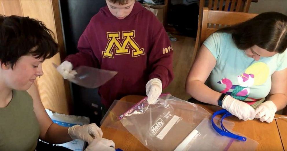 PHOTO: The Westlake family in St. Paul, Minn., prepare face shield kits for delivery to local hospitals and public safety offices. The materials are produced by 3D printers in the family's home.
