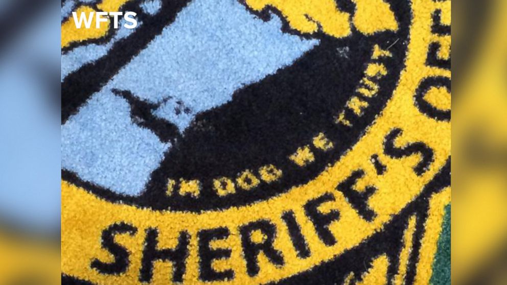 WFTS in Tampa Bay, Fla. reports that the Pinellas County Sheriff's Office received a new rug with a typo that appears to read, "In Dog We Trust." 