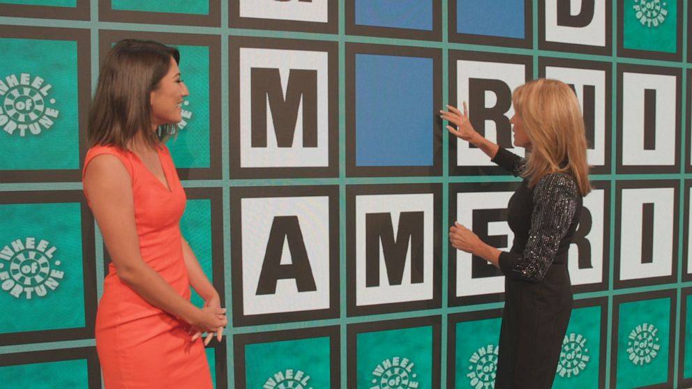 PHOTO: 'Wheel of Fortune' presenter Vanna White shows off the new puzzle board to ABC News' Veronica Miracle.