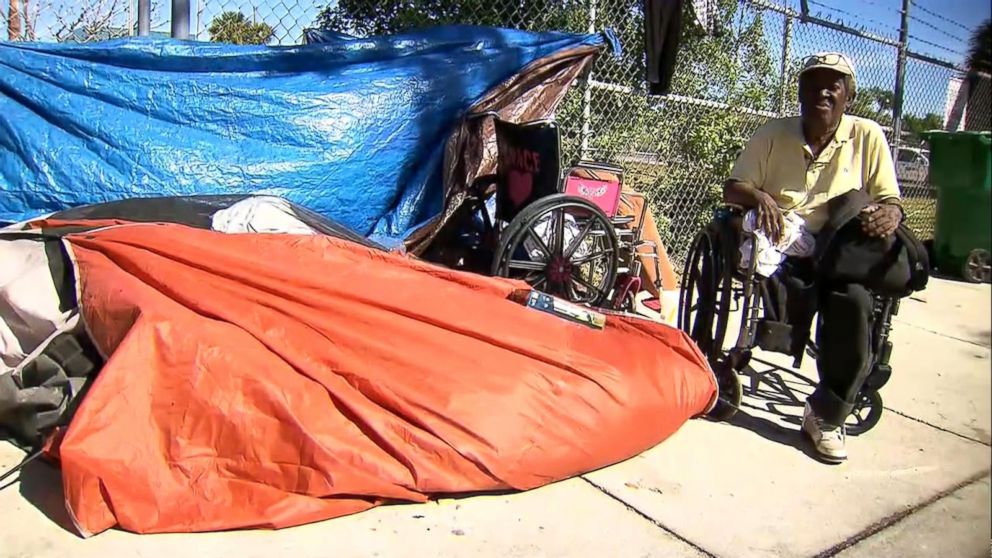 PHOTO: Anna Lazcano of the Miami Police Department provided a new wheelchair to a homeless amputee who was struggling to get around in his old one.