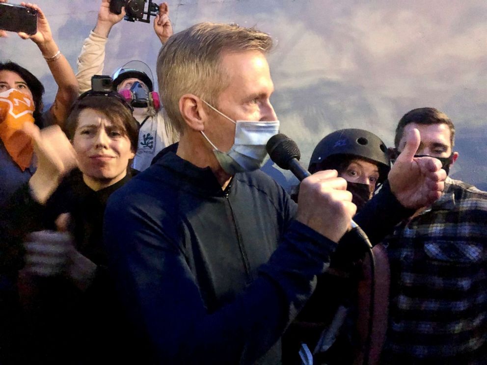 PHOTO: Mayor Ted Wheeler speaks to people gathered in downtown Portland, Ore. on July 22, 2020.