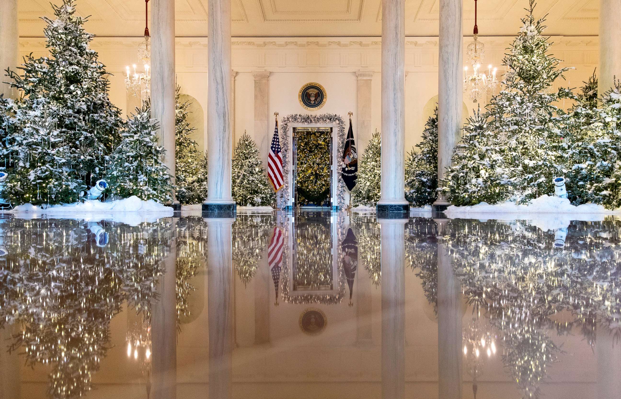 PHOTO: The Grand Foyer and Cross Hall are decorated with "The Nutcracker Suite" theme during a media preview of holiday decorations at the White House,Nov. 27, 2017. 