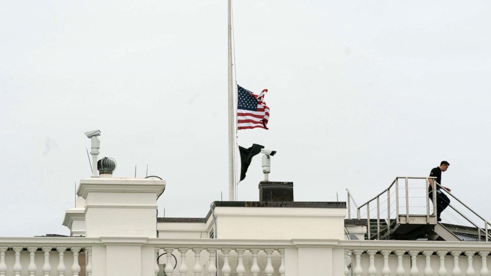 PHOTO: An American flag flies at half-staff at the White House, Tuesday, May 24, 2022, in Washington, to honor the victims of the mass shooting at Robb Elementary School in Uvalde, Texas.