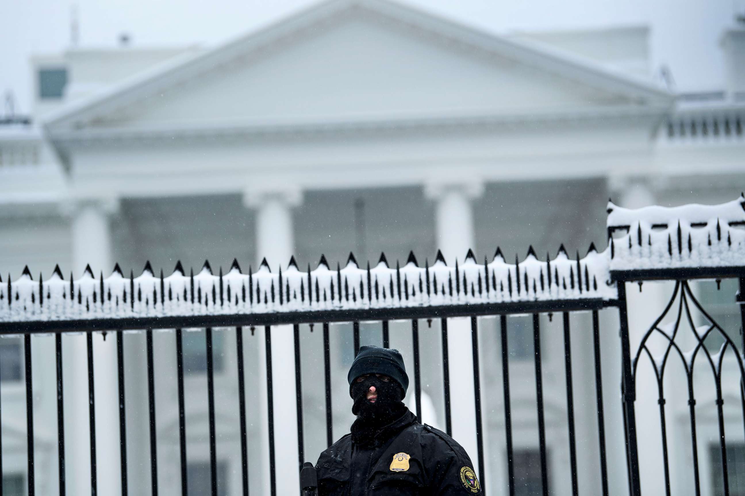 PHOTO: A member of the Secret Service stands guard outside the White House, Jan. 13, 2019, in Washington.