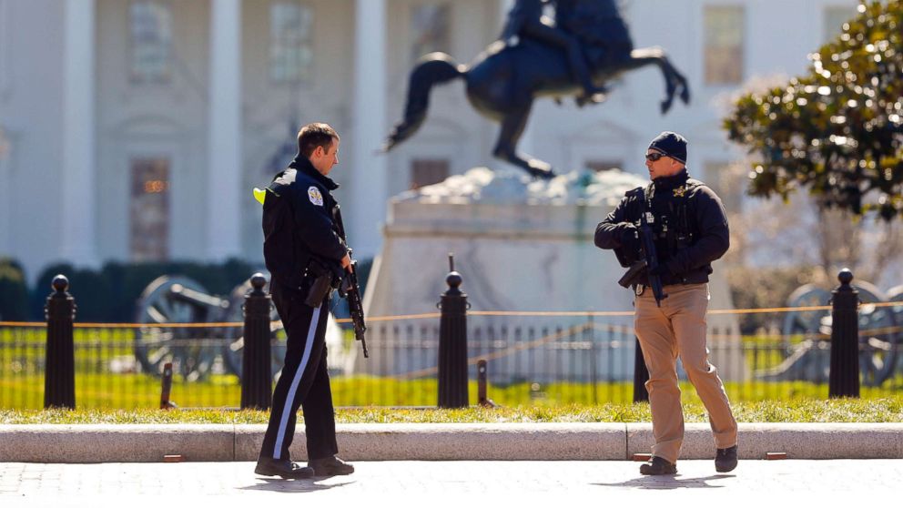Law enforcement officers at Lafayette Park across from the White House in Washington, close the area to pedestrian traffic, March 3, 2018.
