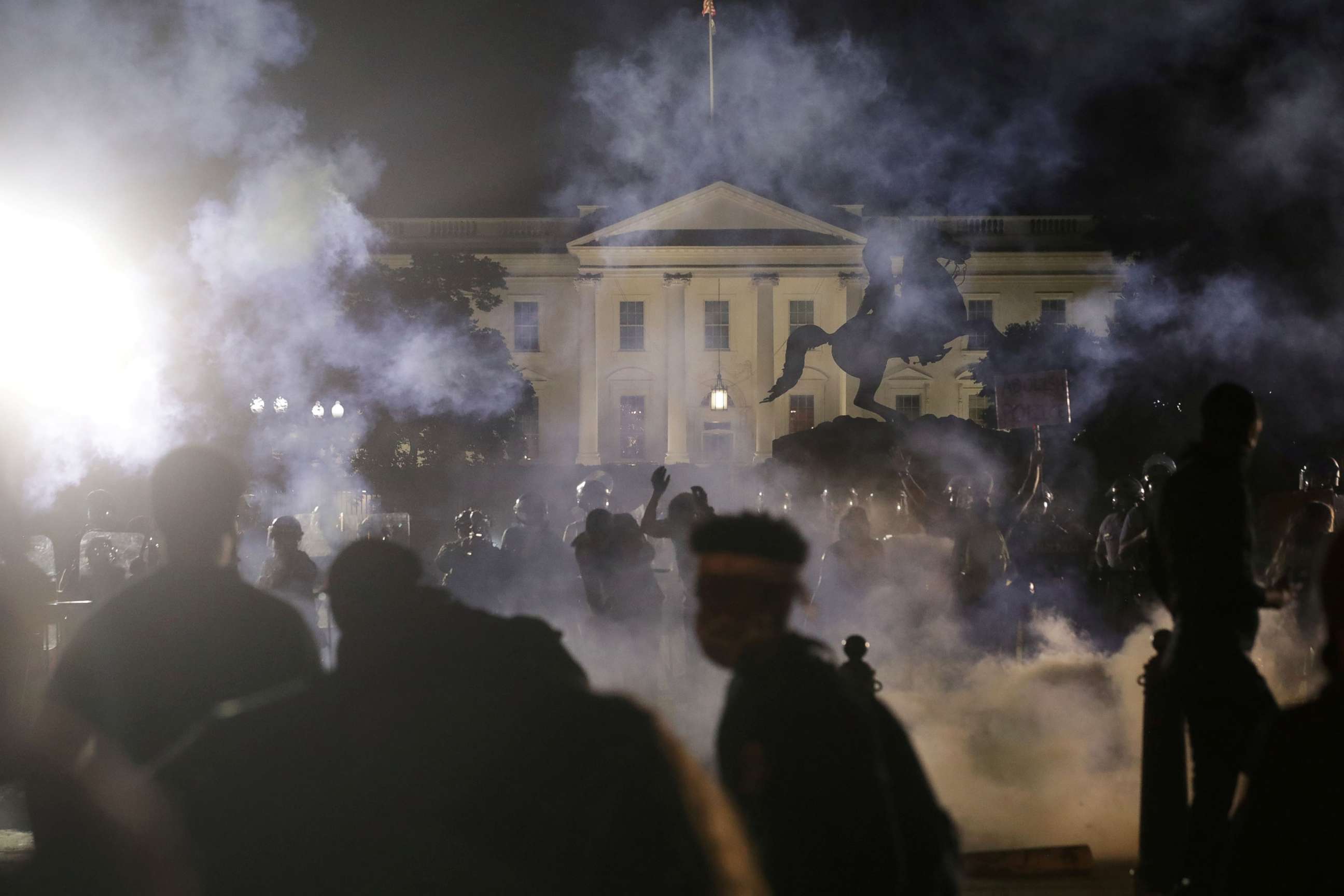 PHOTO: Tear gas fills the air as protesters rally outside the White House against the death in Minneapolis police custody of George Floyd, in Washington, D.C., May 31, 2020.