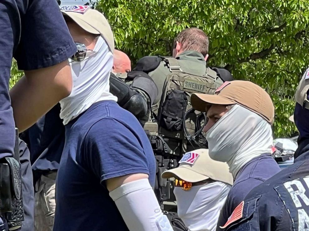 PHOTO:  Authorities arrest members of the white supremacist group Patriot Front near an Idaho pride event on June 11, 2022, after they were found packed into the back of a U-Haul truck with riot gear.