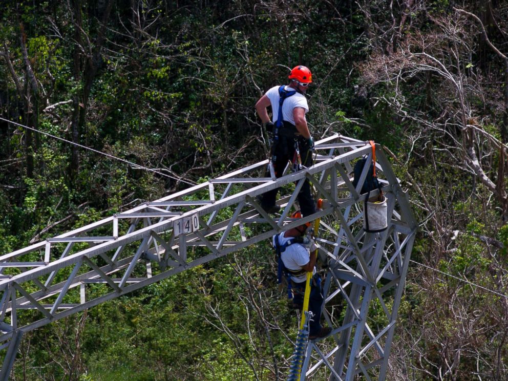 PHOTO: Whitefish Energy Holdings workers restore power lines damaged by Hurricane Maria in Barceloneta, Puerto Rico, Oct. 15, 2017.