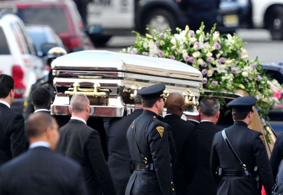 PHOTO: Pallbearers carry Whitney Houston's casket to a hearse outside New Hope Baptist Church after funeral services on Feb. 18, 2012, in Newark, N.J.