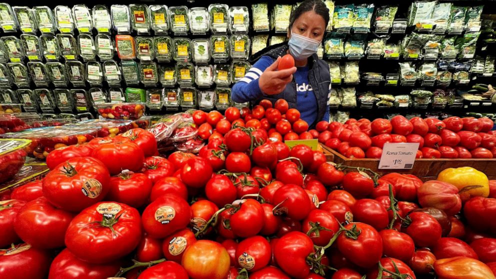 FILE PHOTO: A person shops at a Whole Foods grocery store in the Manhattan borough of New York City, New York, U.S., March 10, 2022.
