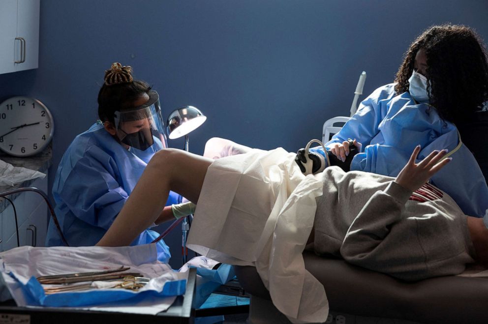 PHOTO: Dr. Shelly Tien, 40, performs an abortion while a nurse assists with ultrasound during the procedure at Planned Parenthood in Birmingham, Alabama, March 14, 2022.