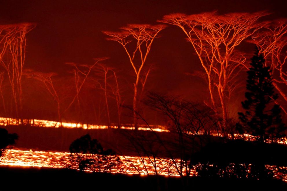 PHOTO: Lava flows on the outskirts of Pahoa during ongoing eruptions of the Kilauea Volcano in Hawaii, June 6, 2018.