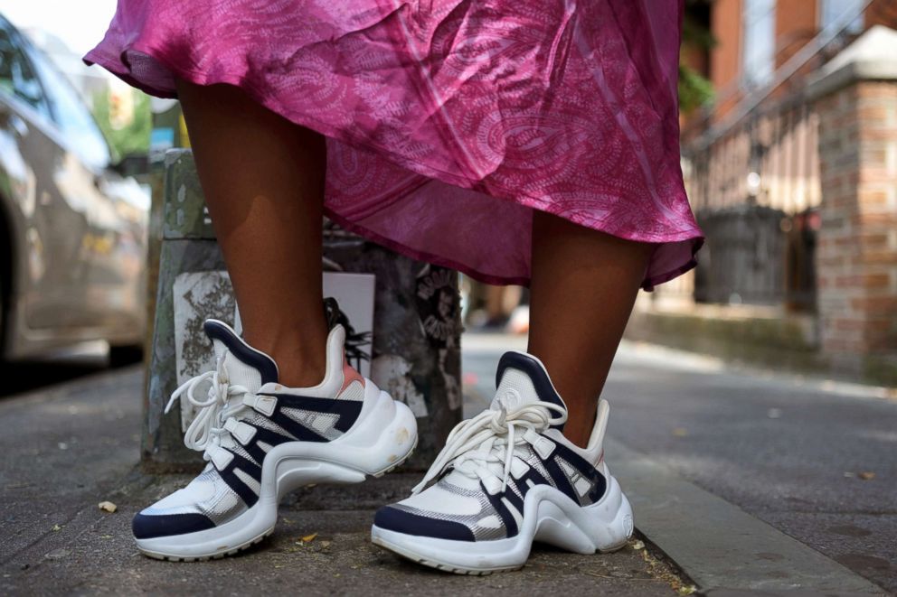 PHOTO: Nia Indigo, 23, a stylist based in New York, poses for a picture wearing a pair of Louis Vuitton Archlight sneakers in Brooklyn, New York, Sept. 2, 2018.