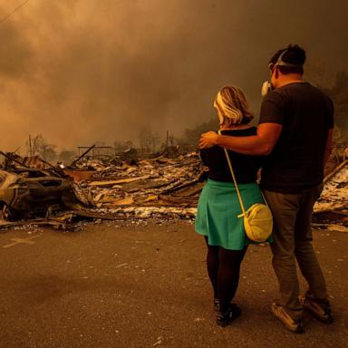 PHOTO: Megan Mantia, and her boyfriend Thomas return to Mantia's fire-damaged home after the Eaton Fire swept through, Jan. 8, 2025, in Altadena, Calif. 