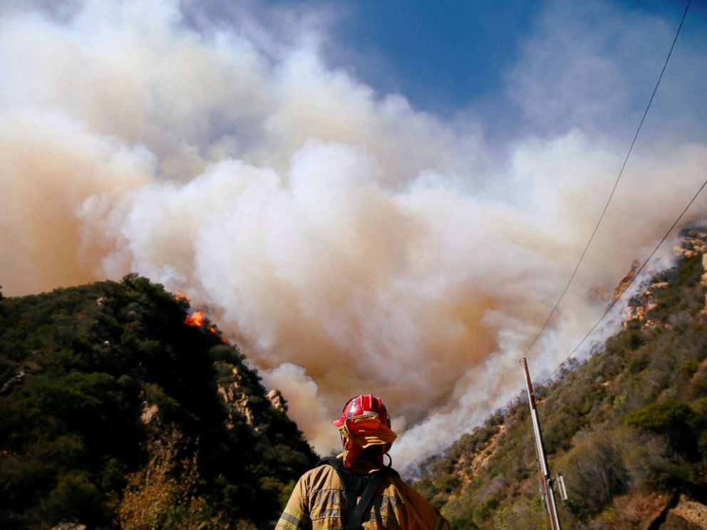 PHOTO: Firefighters battle the Woolsey Fire as it continues to burn in Malibu, Calif., Nov. 11, 2018. 