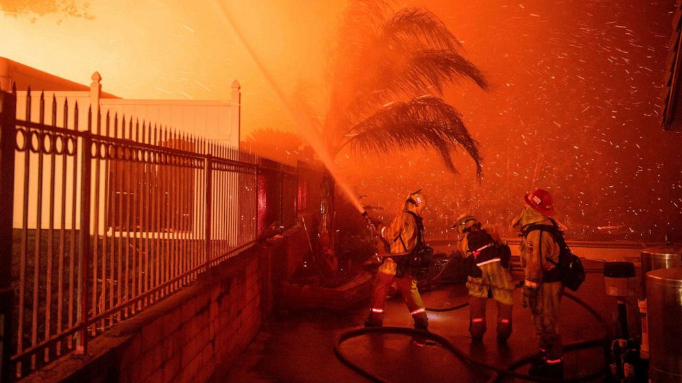 PHOTO:Firefighters battle wind-whipped flames engulfing multiple homes during the Hillside Fire in the North Park neighborhood of San Bernardino, Calif., Oct. 31, 2019.
