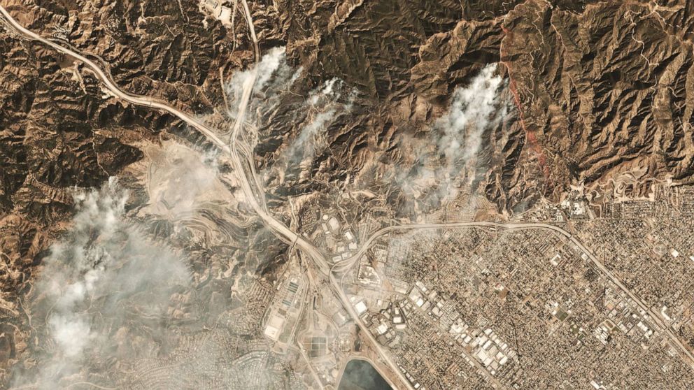 PHOTO: This October 11, 2019, image courtesy of Planet Labs Inc., shows smoke from the Saddleridge Fire about 20 miles north of downtown Los Angeles.