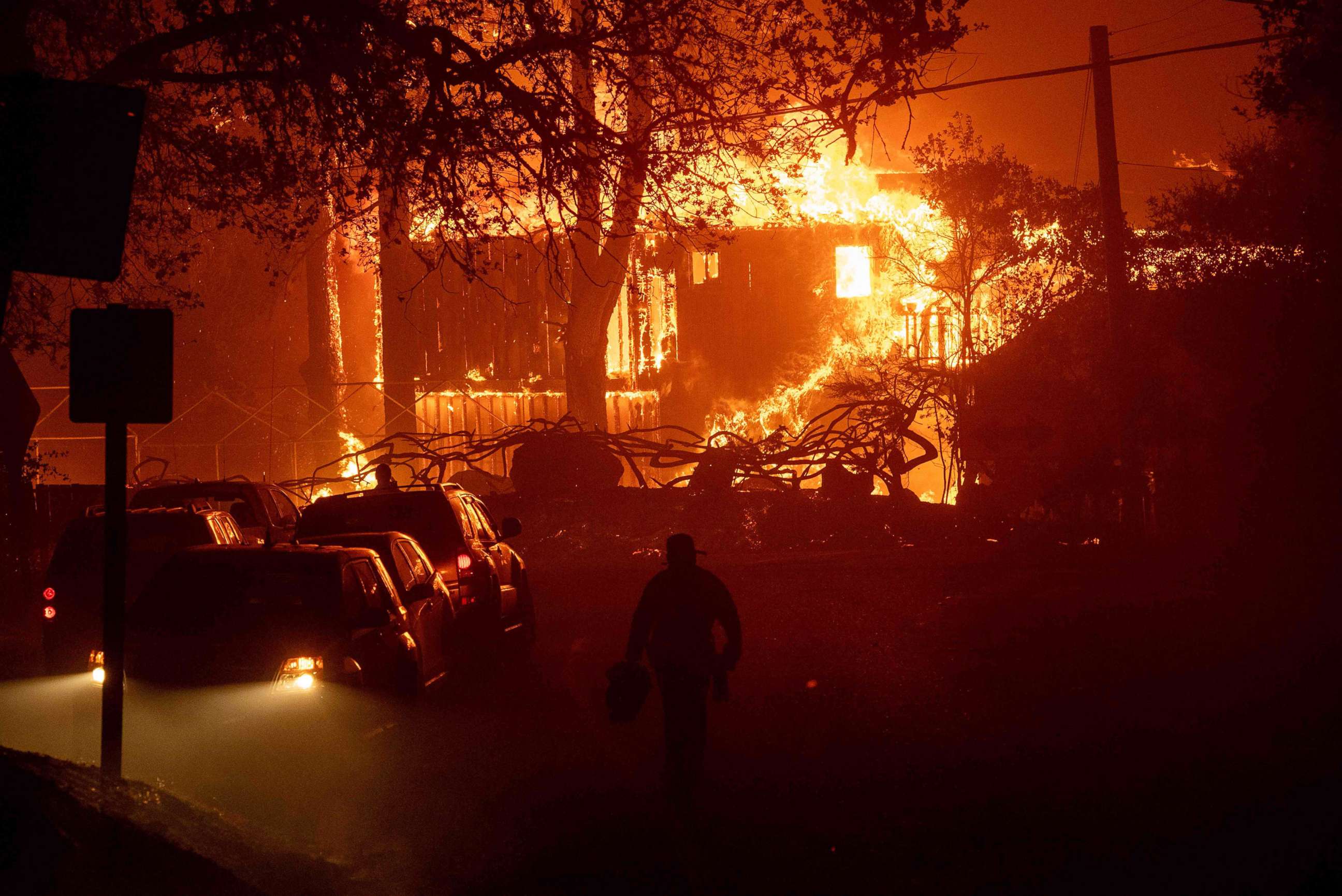 PHOTO: A home is engulfed in flames as wind and embers rip through the area during the Kincade fire near Geyserville, Calif., Oct. 24, 2019.