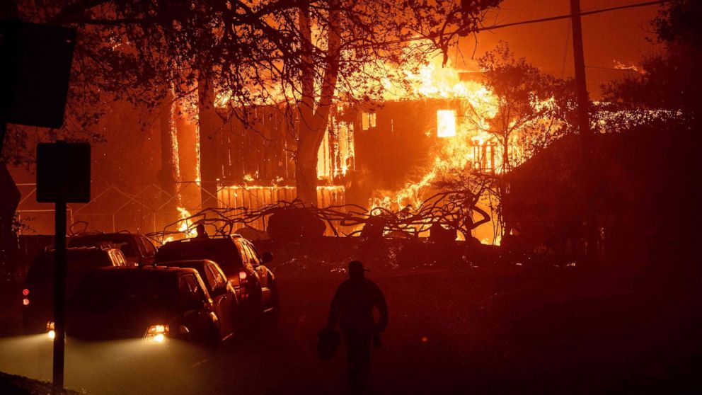 PHOTO: A home is engulfed in flames as wind and embers rip through the area during the Kincade fire near Geyserville, Calif., Oct. 24, 2019.