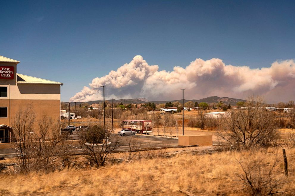 PHOTO: The Calf Canyon fire, seen from a westbound Amtrak train, burns near Las Vegas, on April 22, 2022.