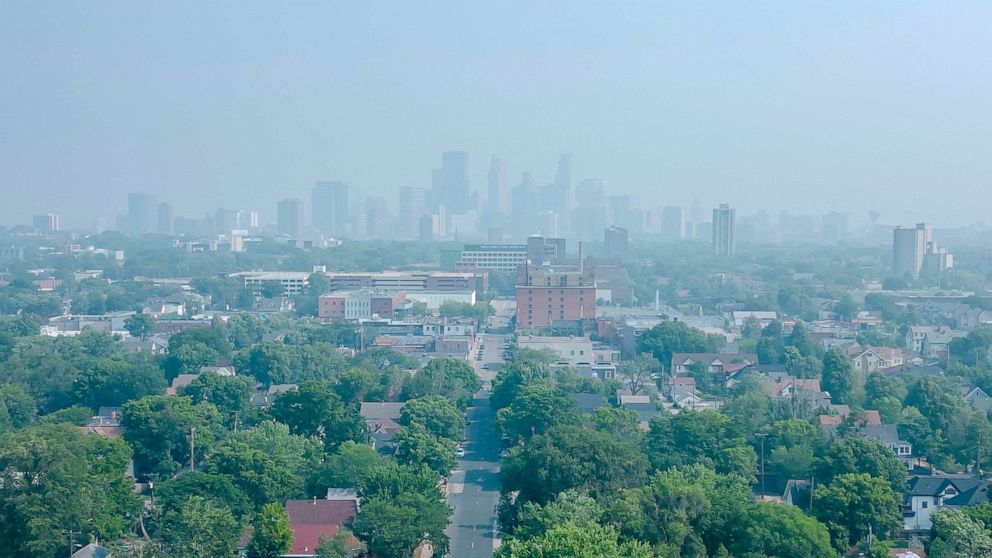 PHOTO: The Minneapolis skyline, seen from the Powderhorn Park, is obscured by wildfire smoke during the air quality alert, June 28, 2023, in Minneapolis.