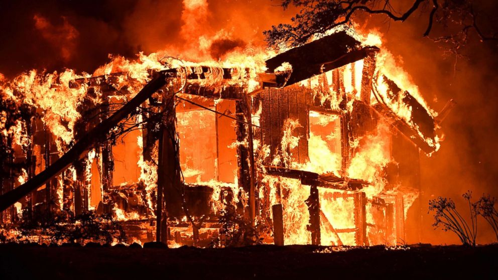 PHOTO: Flames ravage a home in the Napa wine region in California, Oct. 9, 2017, as multiple wind-driven fires continue to whip through the region.