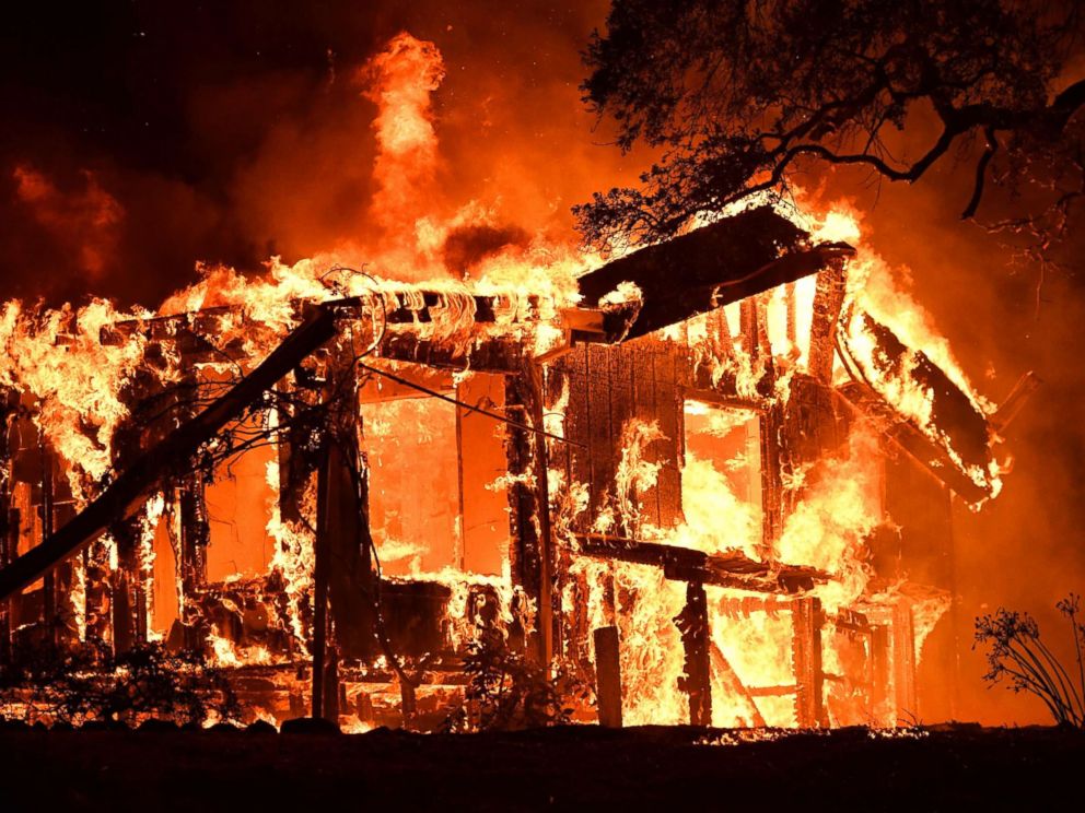 PHOTO: Flames ravage a home in the Napa wine region in California, Oct. 9, 2017, as multiple wind-driven fires continue to whip through the region.