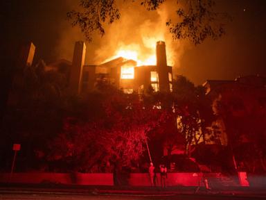 California fires live updates: LA sheriff says city looks like ‘atomic bomb dropped'