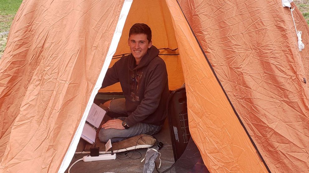 Cadet William Taylor is finishing his college semester in an orange tent. In the cold. In the middle of a field.