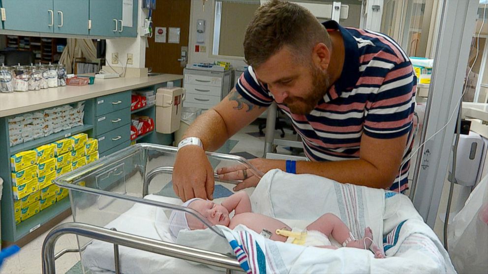 PHOTO: William Weeks spends time with his newborn daughter, Loralynn, in the nursery room of Christus Spohn Hospital Corpus Christi South in Corpus Christi, Texas.