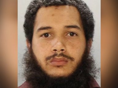 Alleged hit man charged with killing 4 in 'wanton, violent crimes'